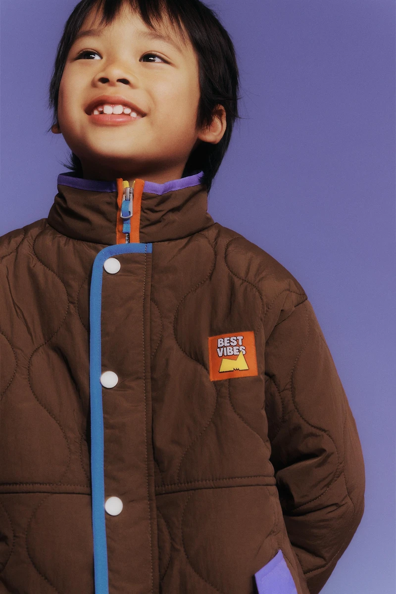 VESTE À DÉTAILS CONTRASTE