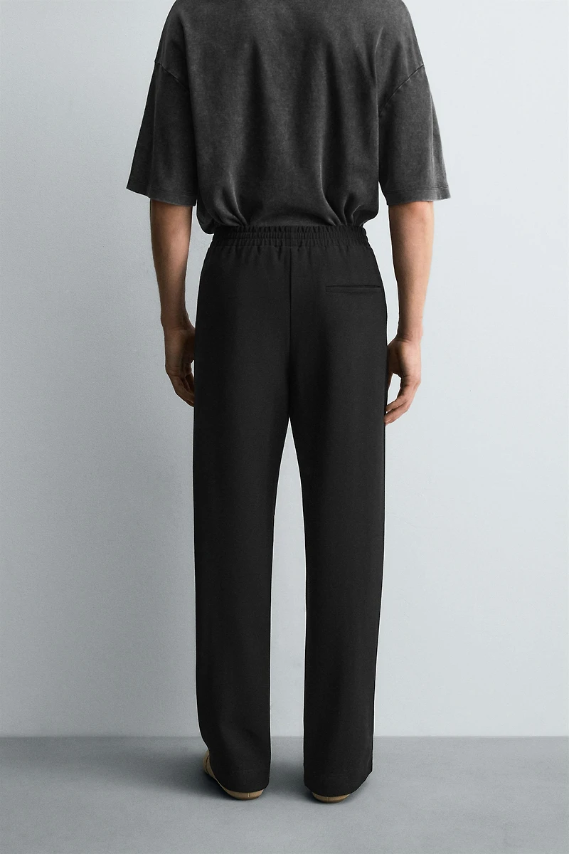 FLOWY ZIPPERED PANTS