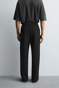 FLOWY ZIPPERED PANTS
