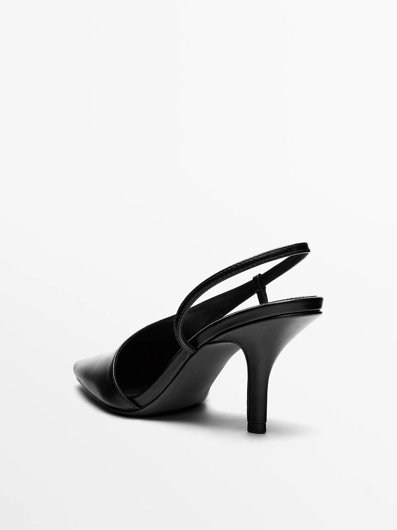 Asymmetric high-heel shoes