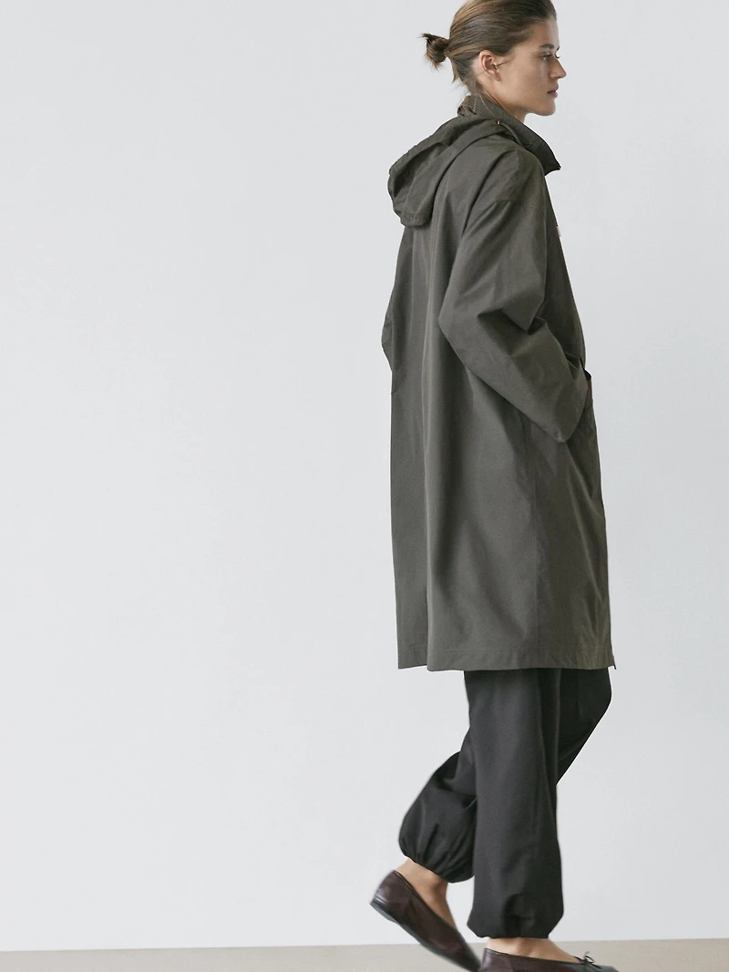 Technical fabric trench coat with hood