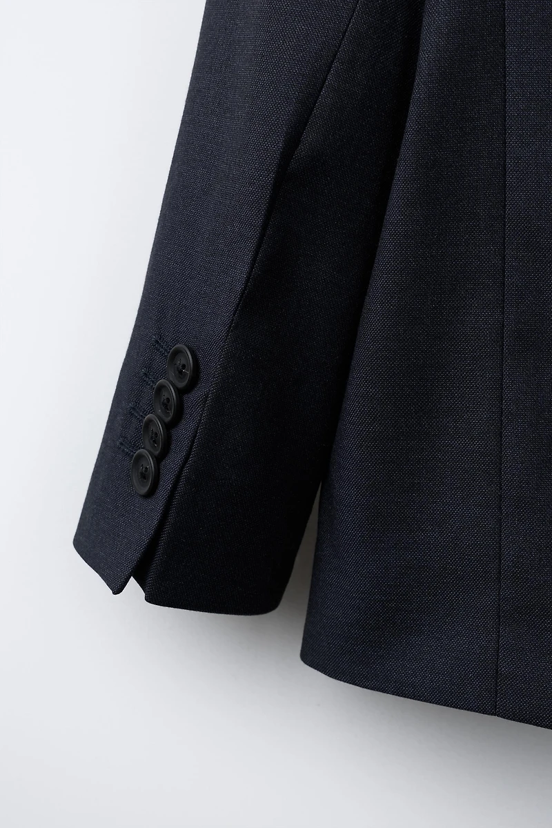 TEXTURED SUIT BLAZER
