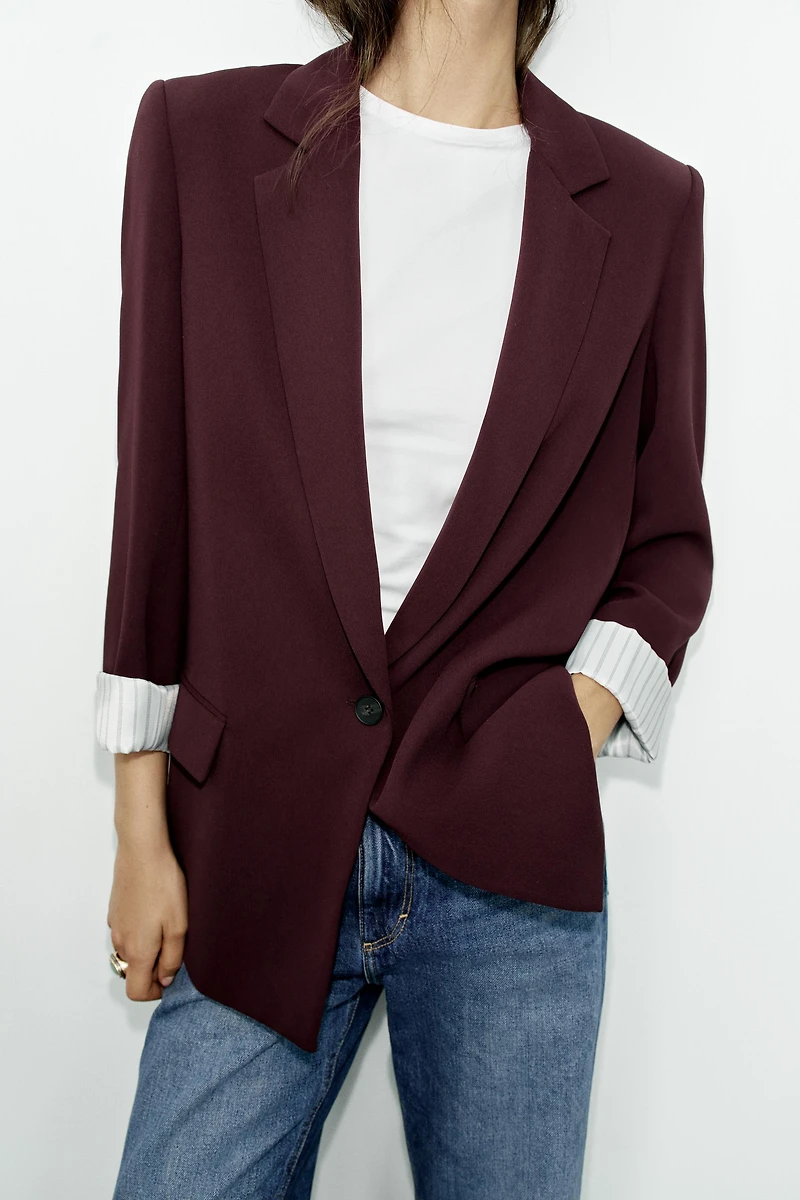 VESTE À ÉPAULETTES ET POIGNETS IMPRIMÉS