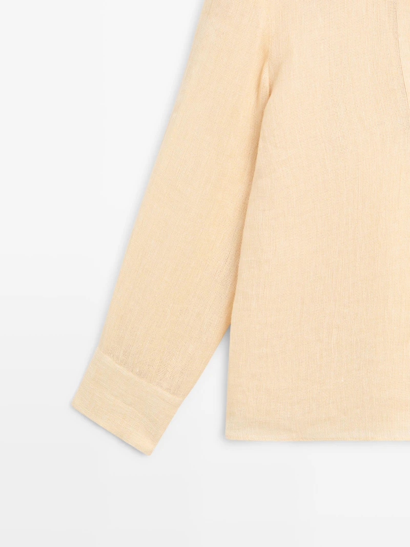 Flowing linen blouse with chest detail