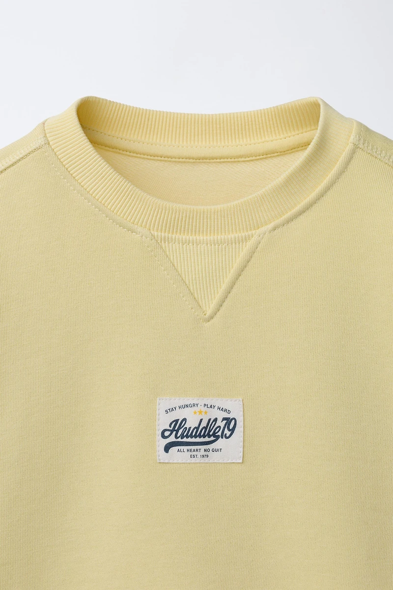 TEXT JOGGING SWEATSHIRT