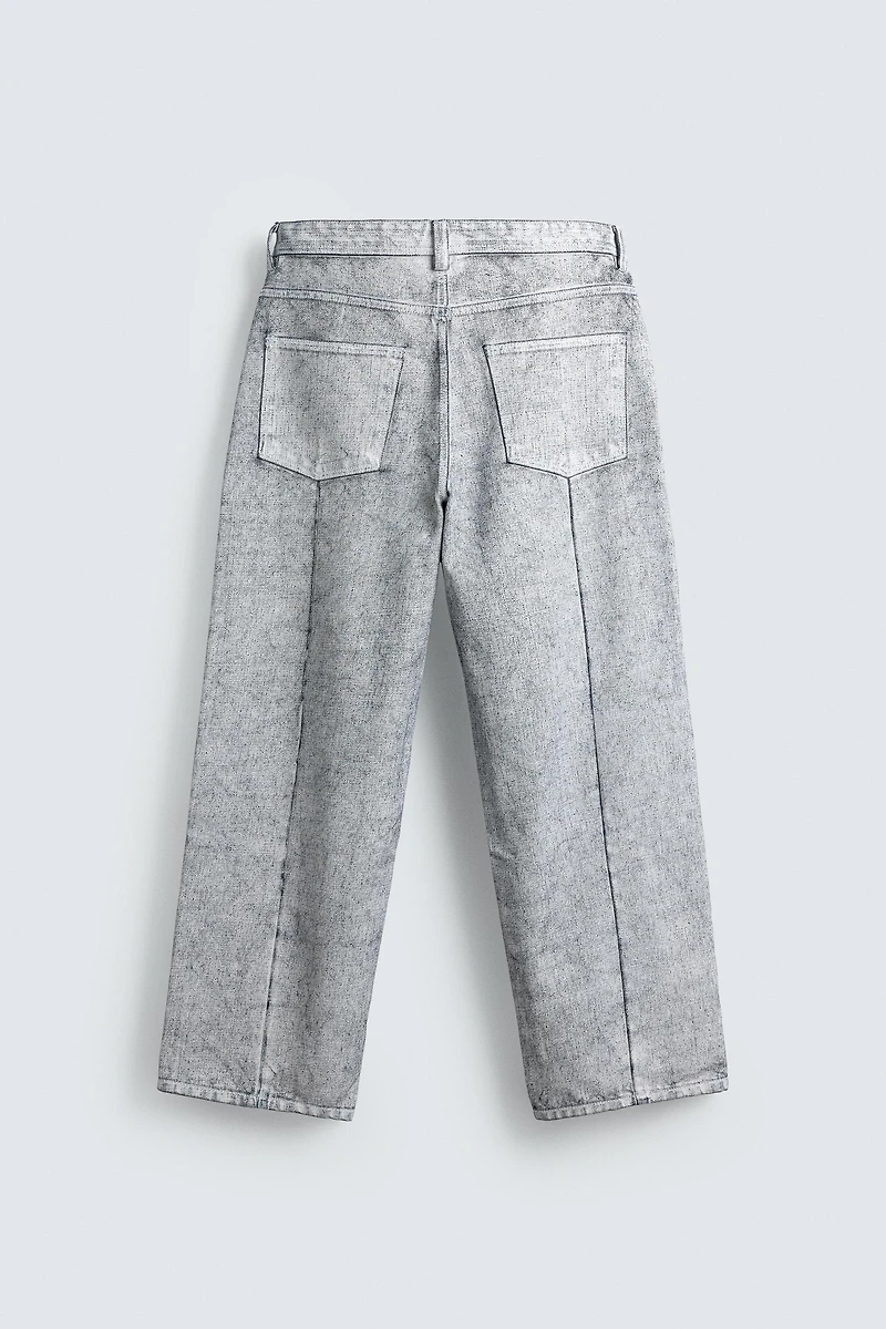 WAXED FINISH BAGGY FIT JEANS