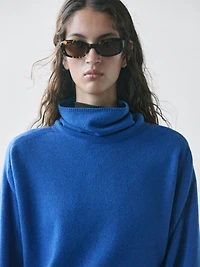 Pull à col montant en maille de laine mélangée