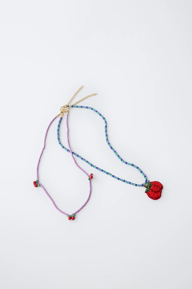 LOT DE DEUX COLLIERS FANTAISIE TOMATE