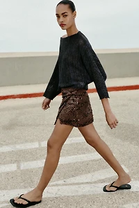 JUPE-PANTALON MINI À PAILLETTES ET NŒUD