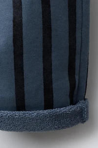PANTALON EN MOLLETON BAGGY À RAYURES