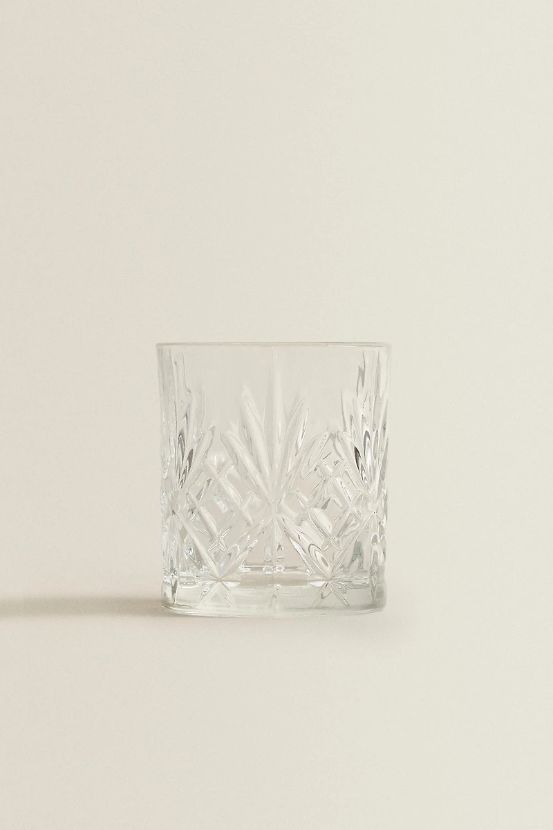 CRYSTALLINE TUMBLER WITH RAISED DESIGN