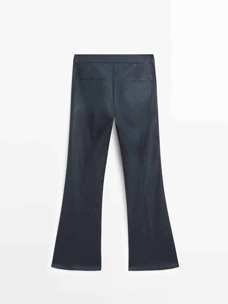Pantalon flare enduit