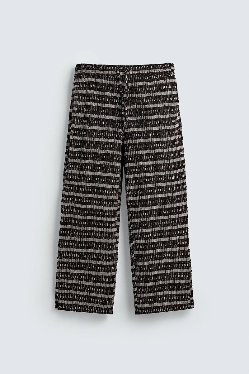 PANTALON JACQUARD AJOURÉ