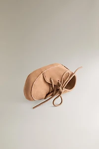 CHAUSSON BOTTE LACETS CUIR