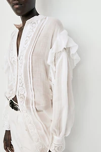 Stand collar blouse with embroidery and ruffles