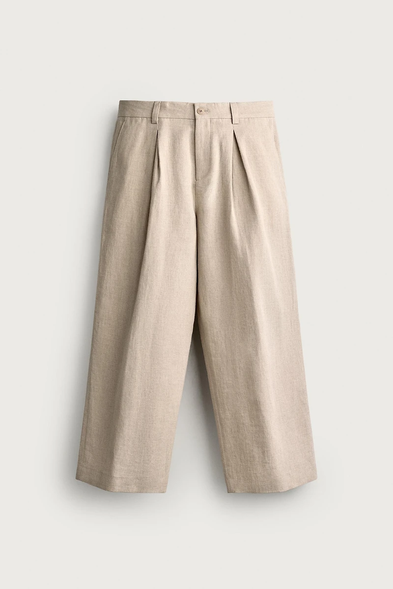 RELAXED FIT PLEATED SUIT PANTS