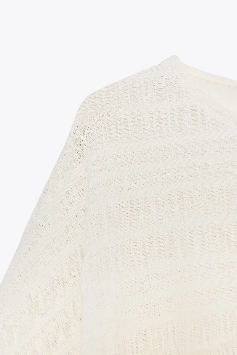 ASYMMETRIC TEXTURED CAPE