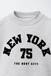 FLOCKED TEXT PRINT SWEATSHIRT