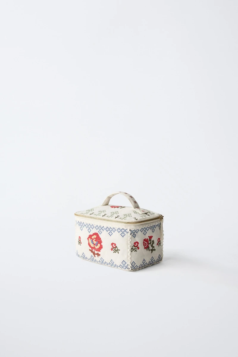 EMBROIDERED TOILETRY BAG