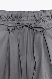 PIPING DETAIL VOLUME SHORTS