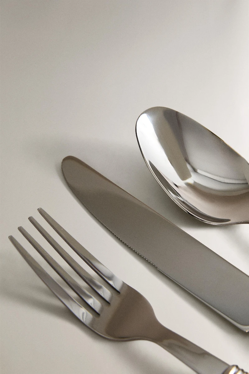 ENSEMBLE COUVERTS MANCHE RAYÉ (LOT DE 4)