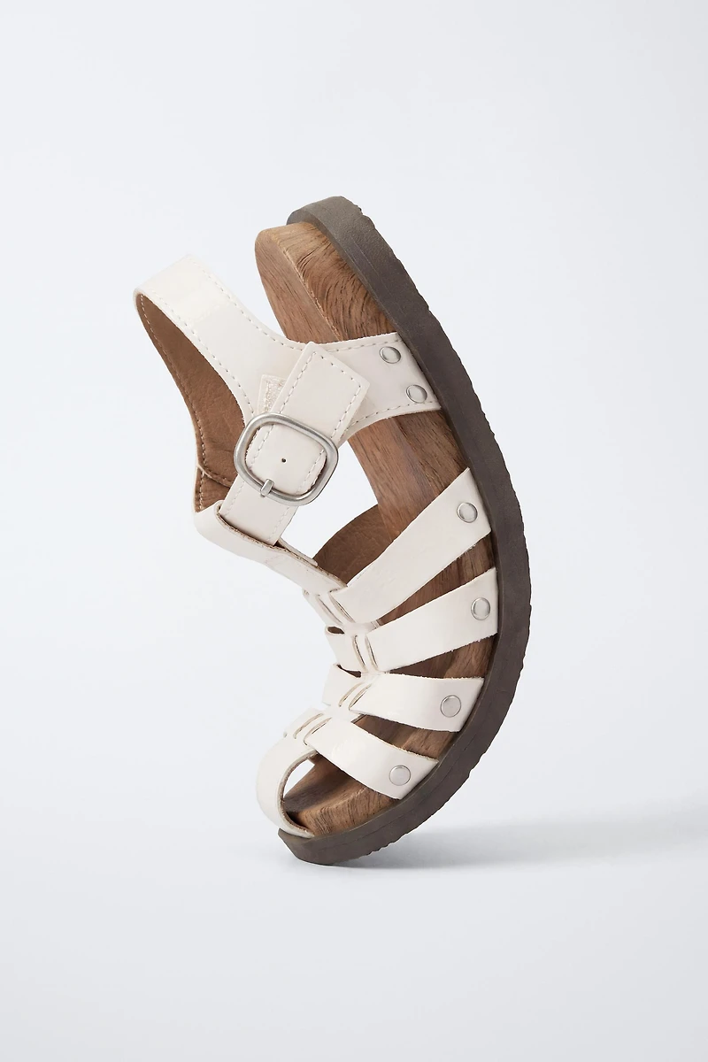 STUDDED FISHERMAN SANDALS