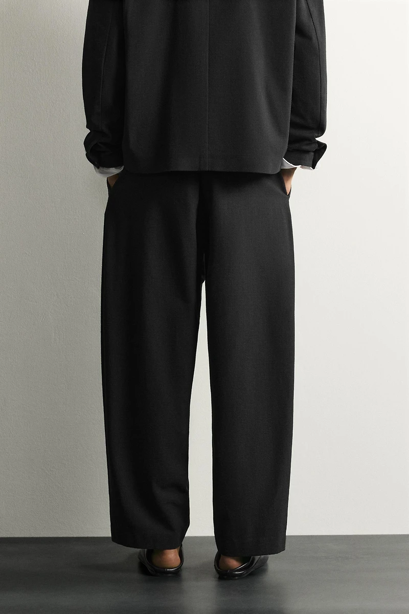 CROSSOVER BALLOON FIT PANTS