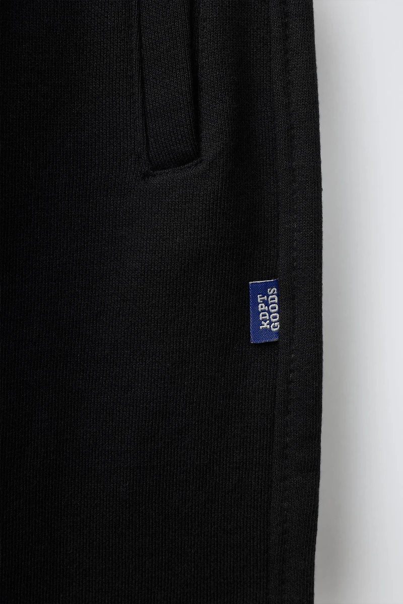 SOLID FLEECE JOGGERS WITH LABEL