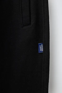 SOLID FLEECE JOGGERS WITH LABEL
