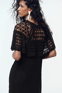 ROBE LONGUE EN MAILLE POINTELLE À VOLANT