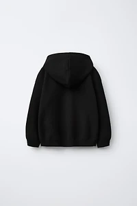 SWEAT À CAPUCHE EN MAILLE