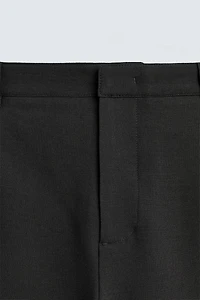 RELAXED FIT PLEATED PANTS