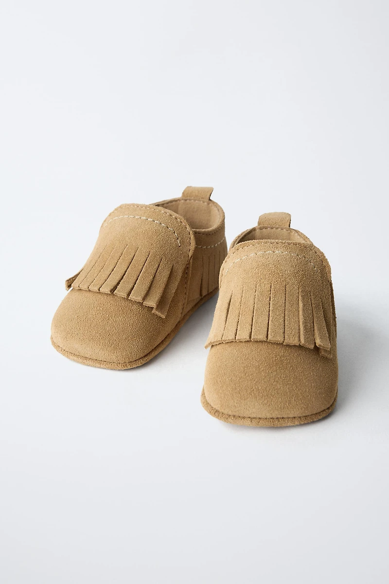 CHAUSSURES EN CUIR