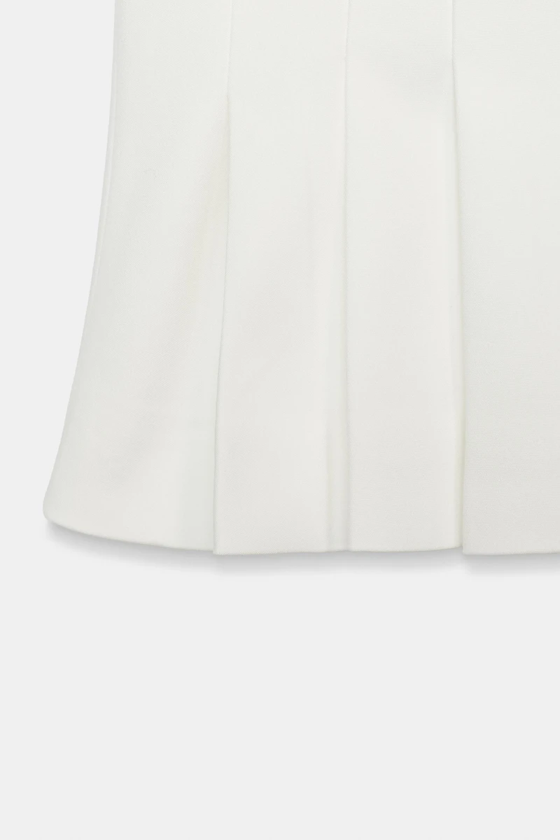 GILET À PINCES