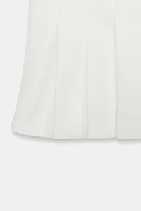 GILET À PINCES