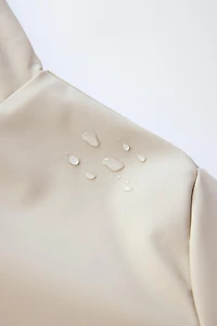 RUBBERIZED WATER RESISTANT FUR EFFECT RAINCOAT