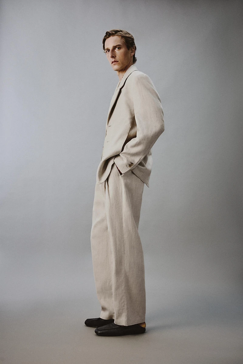 PANTALON À PLIS EN COTON ET LIN