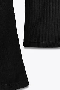 RIB TOP WITH FLARED SLEEVES