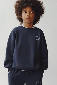 SWEAT BASIQUE À INSCRIPTION