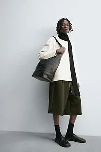 NEOPRENE EFFECT PLEATED LONG BERMUDA SHORTS