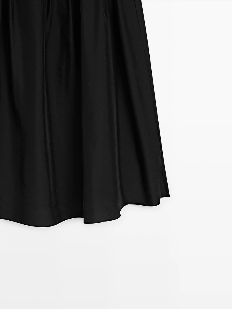 Jupe midi fluide avec détails de pinces