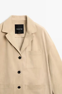 Blazer à poches en cuir velours