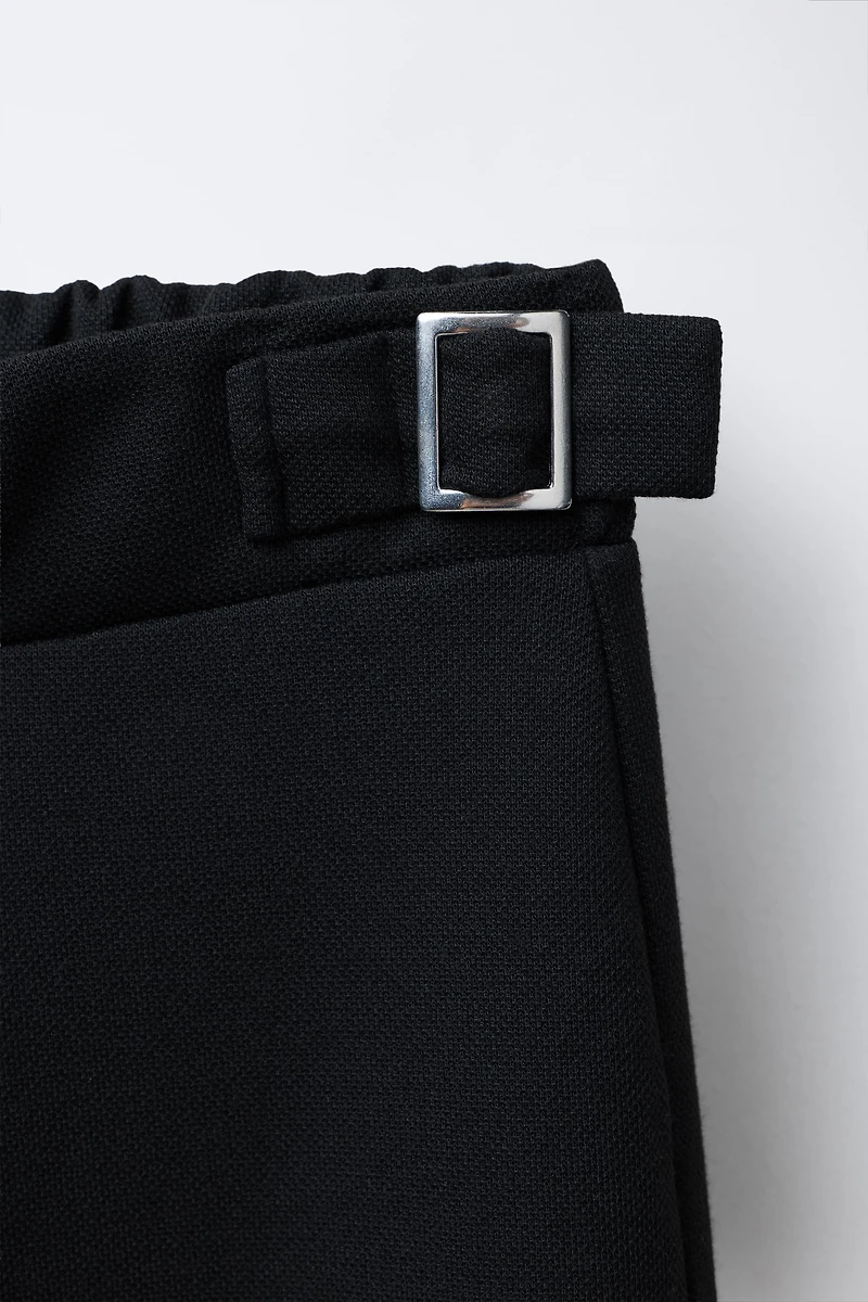 BUCKLED SUIT PANTS