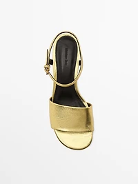 Golden slide sandals
