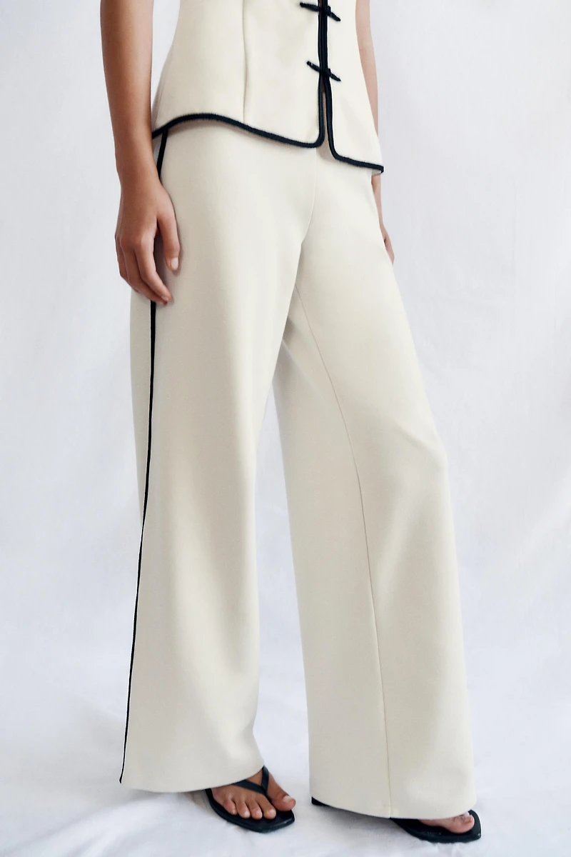 PANTALON LARGE À LISERÉS