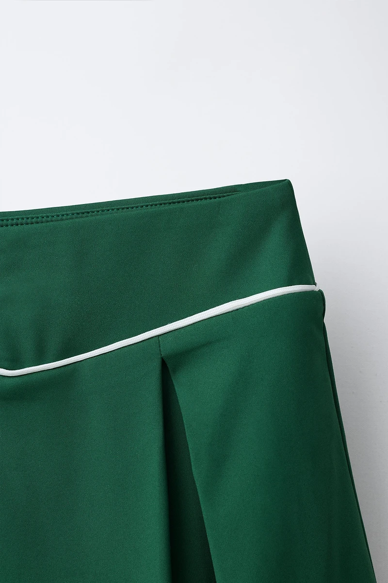 CONTRAST PIPING BOX PLEAT SKIRT