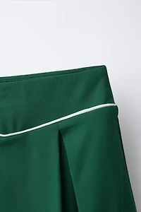 CONTRAST PIPING BOX PLEAT SKIRT