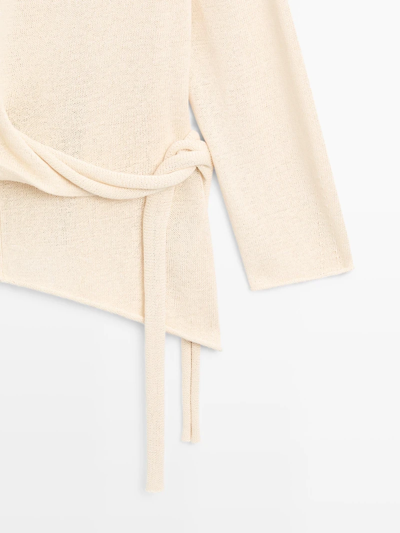Asymmetric linen blend sweater with tie detail