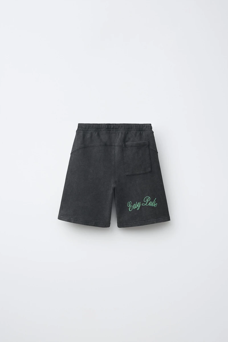 WASHED EFFECT TEXT SHORTS