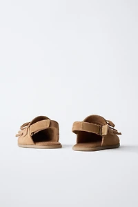 SABOTS EN CUIR PIEDS NUS